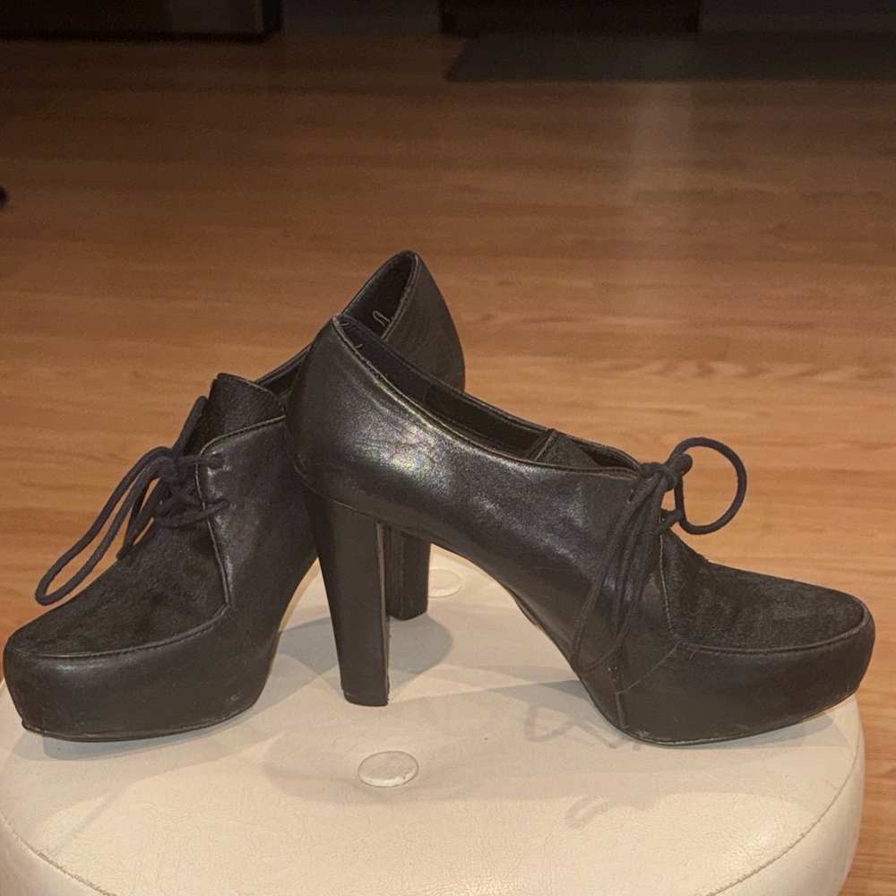 Me Too platform leather and and calf hair bootie with laces.